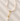 Pearl necklace with a gold chain and pearl pendant on a textured beige surface