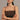 Woman wearing a brown top with thin straps and gold jewelry against a neutral background